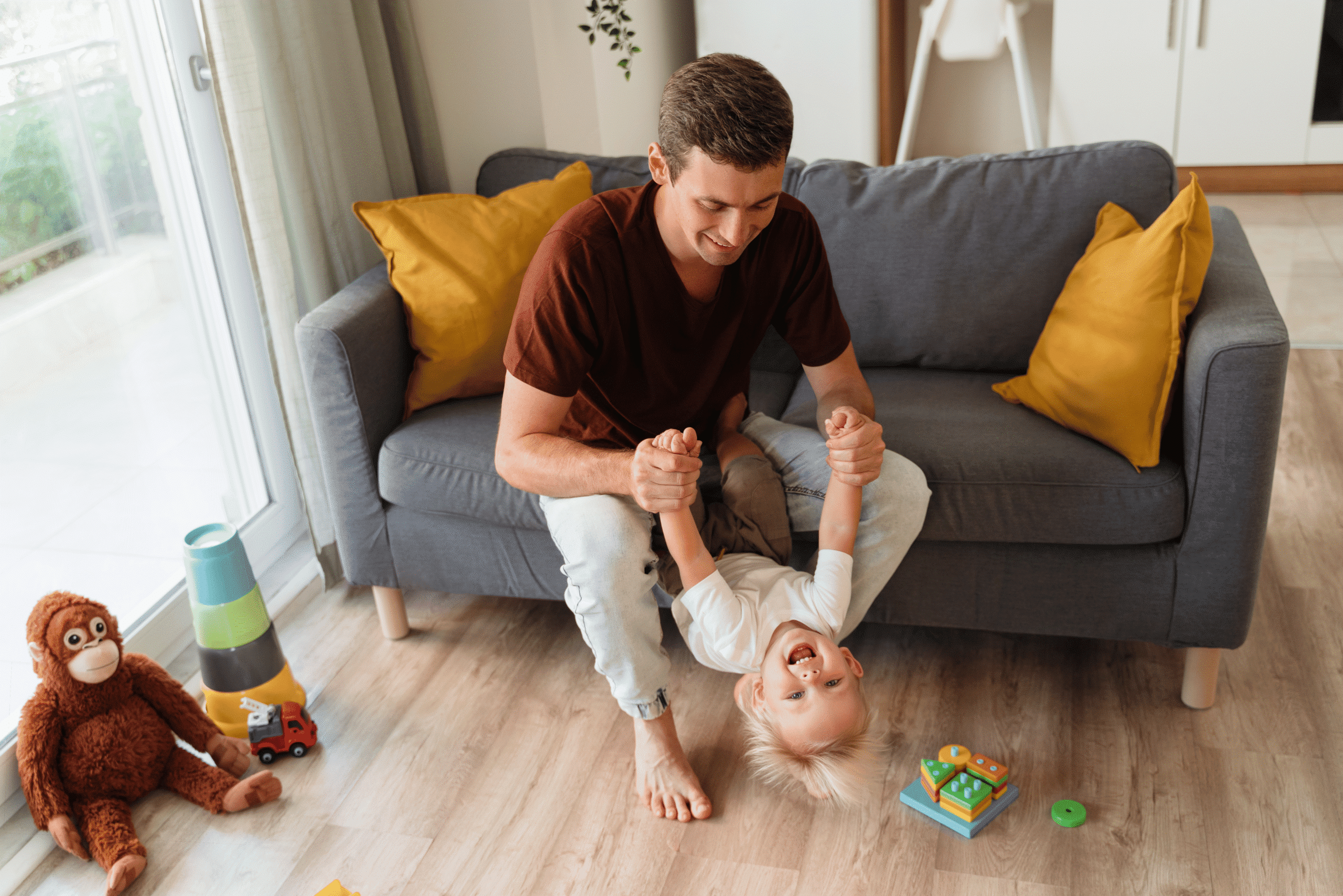 single dad playing with child pennington family in clayton